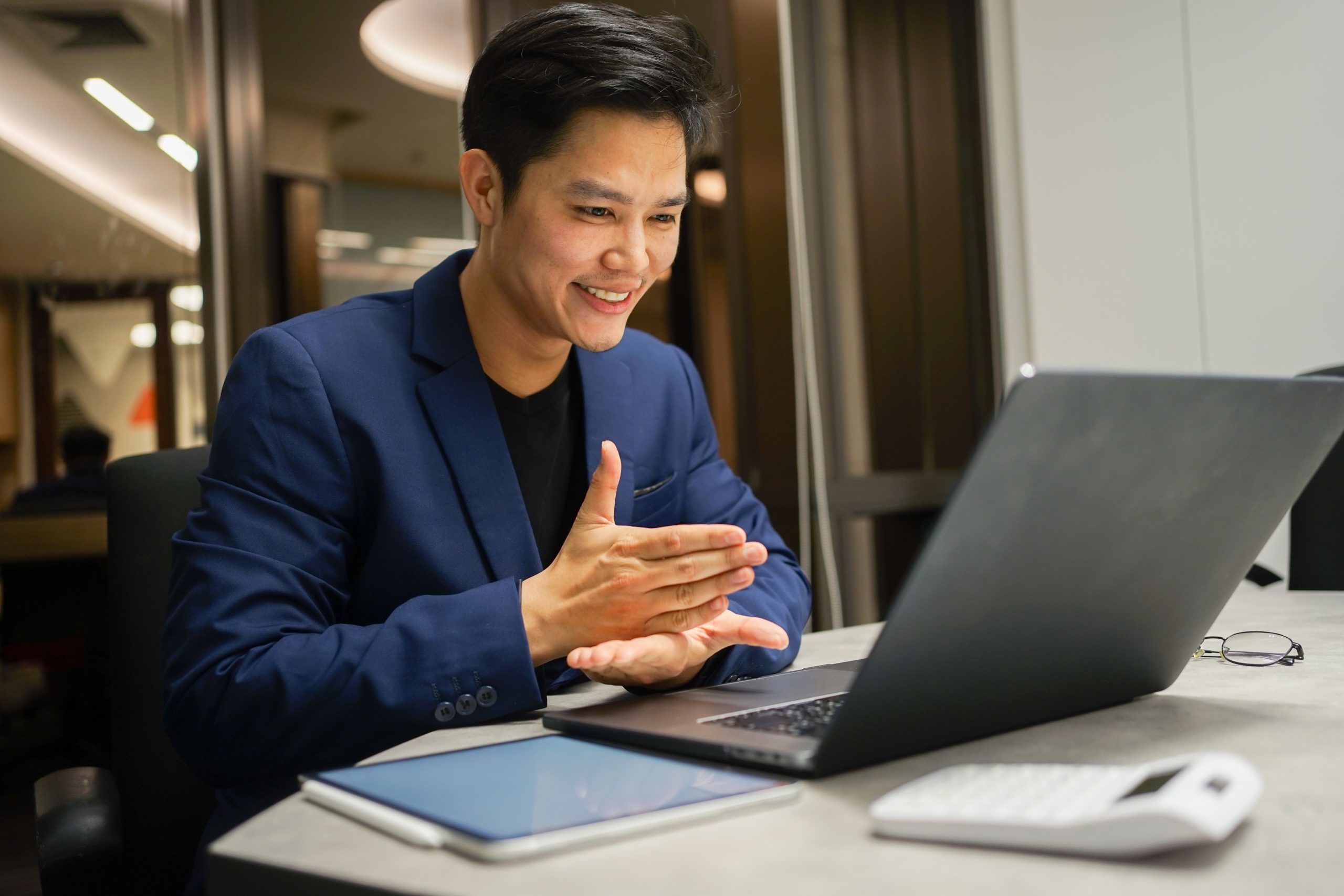 Close,Up,Asian,Businessman,Make,Gesture,Hand,About,Help,Sign